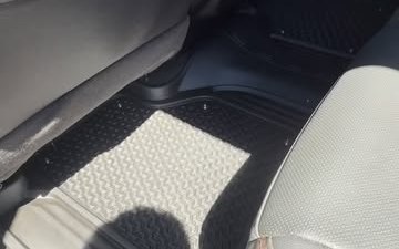 Rear floor of a vehicle after a Vireluxe interior detail